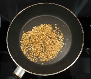 Roasting rice in a pan