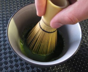 Whisking matcha