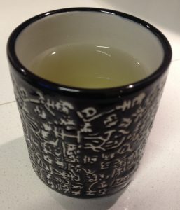 Green tea in black yunomi