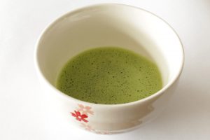 Kiss Me Organics Ceremonial Matcha brewed